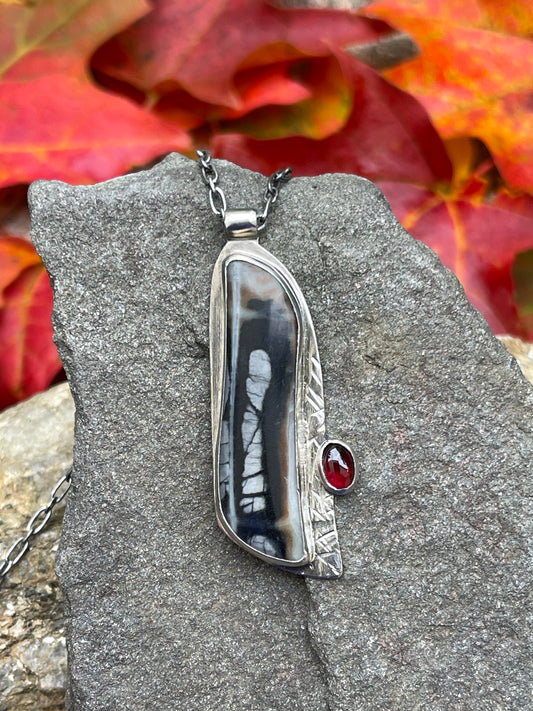 Handmade sterling silver Picasso jasper and garnet pendant, front view