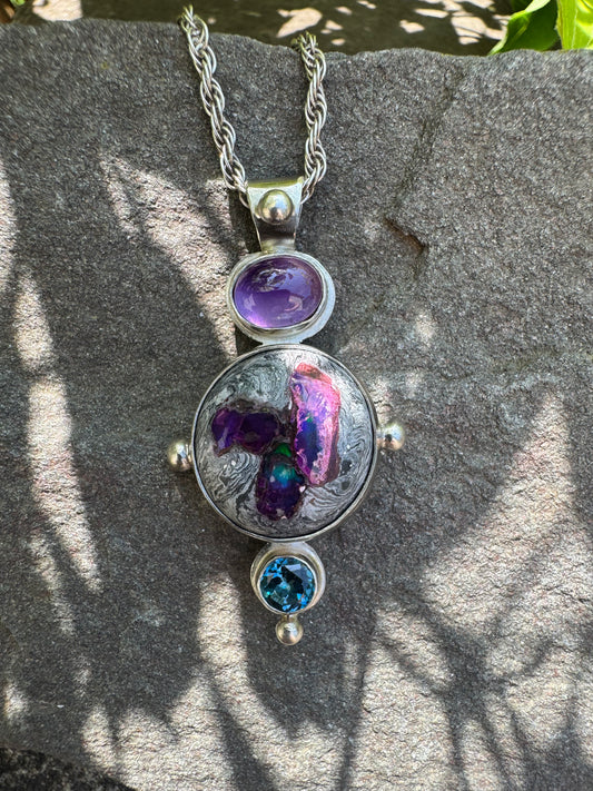 Handmade sterling silver amethyst, fire opal and london blue topaz pendant, front view