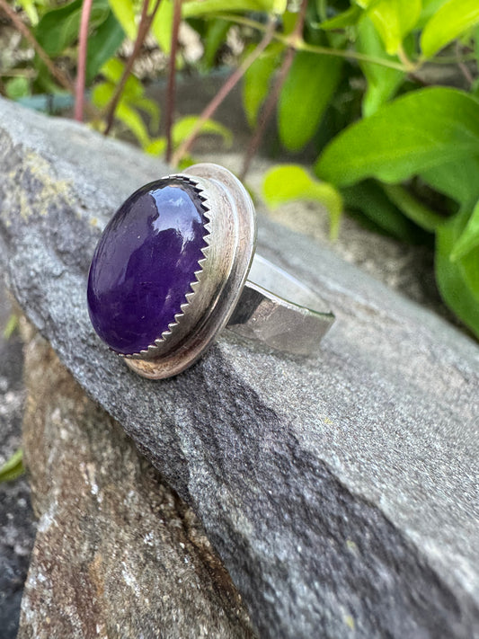 Handmade sterling silver large amethyst ring with serrated bezel and wide band, alternate view