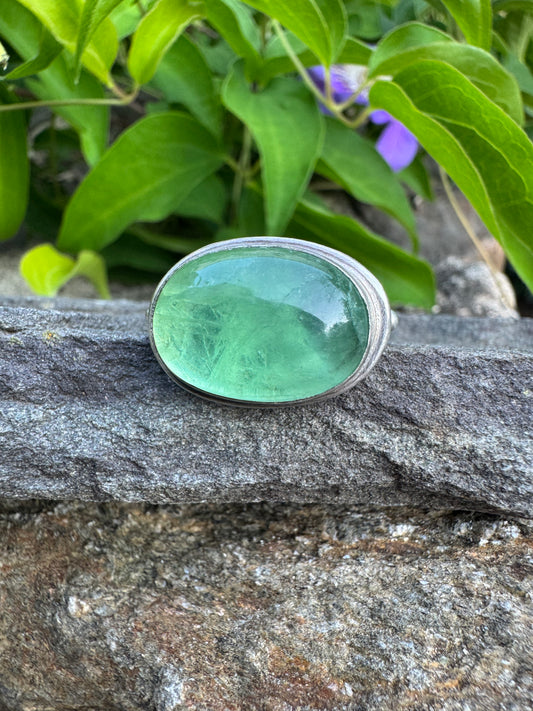 Handmade sterling silver fluorite ring with jade detail, front view