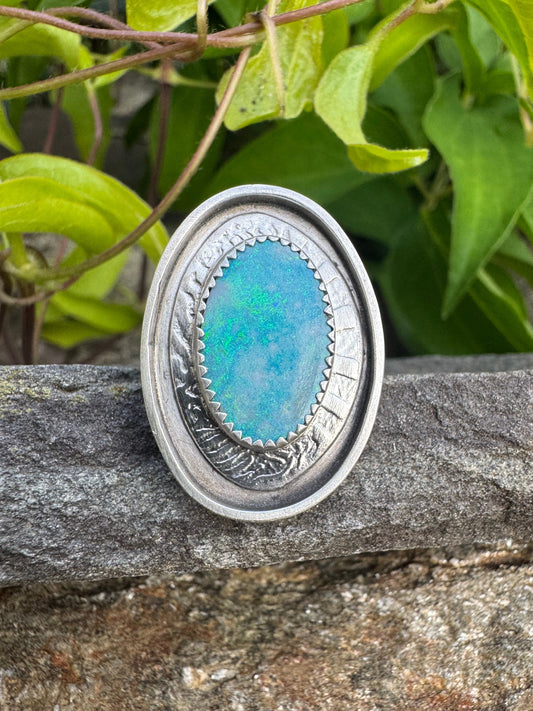Handmade sterling silver Australian opal ring in sterling silver with beaded bezel, front view
