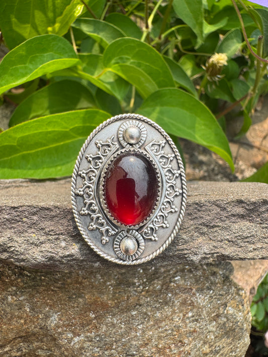 Handmade sterling silver garnet ring, front view