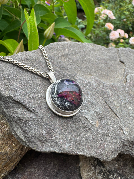Handmade sterling silver fire opal pendant in sterling silver with rolled border, alternate view