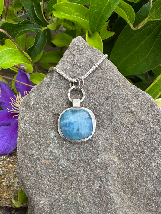 Handmade sterling silver aquamarine square pendant in sterling silver with oxidized ring bail, front view