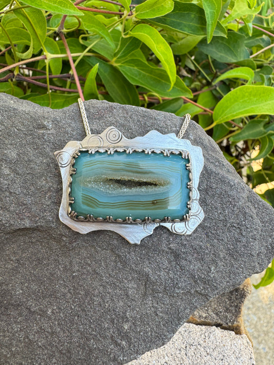 Handmade sterling silver dendritic opal landscape pendant, front view