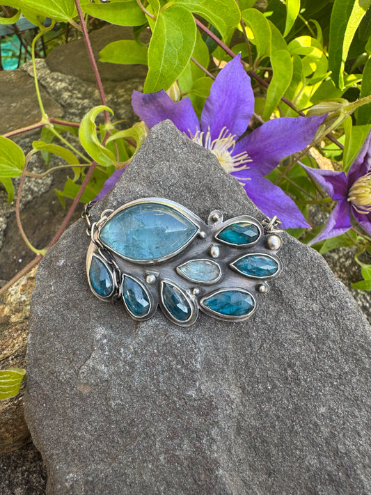 Handmade sterling silver blue topaz cluster necklace, front view