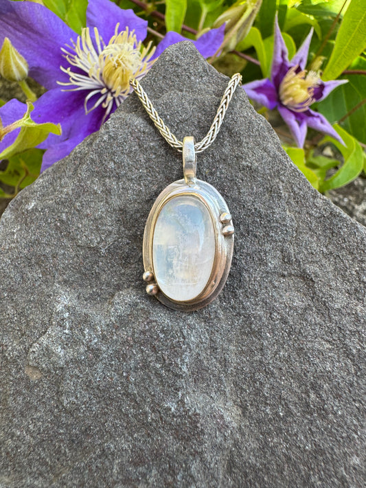 Handmade sterling silver moonstone oval pendant, front view