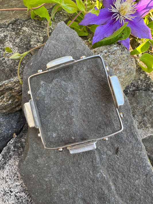 Handmade sterling silver moonstone and sapphire square-link bracelet, front view