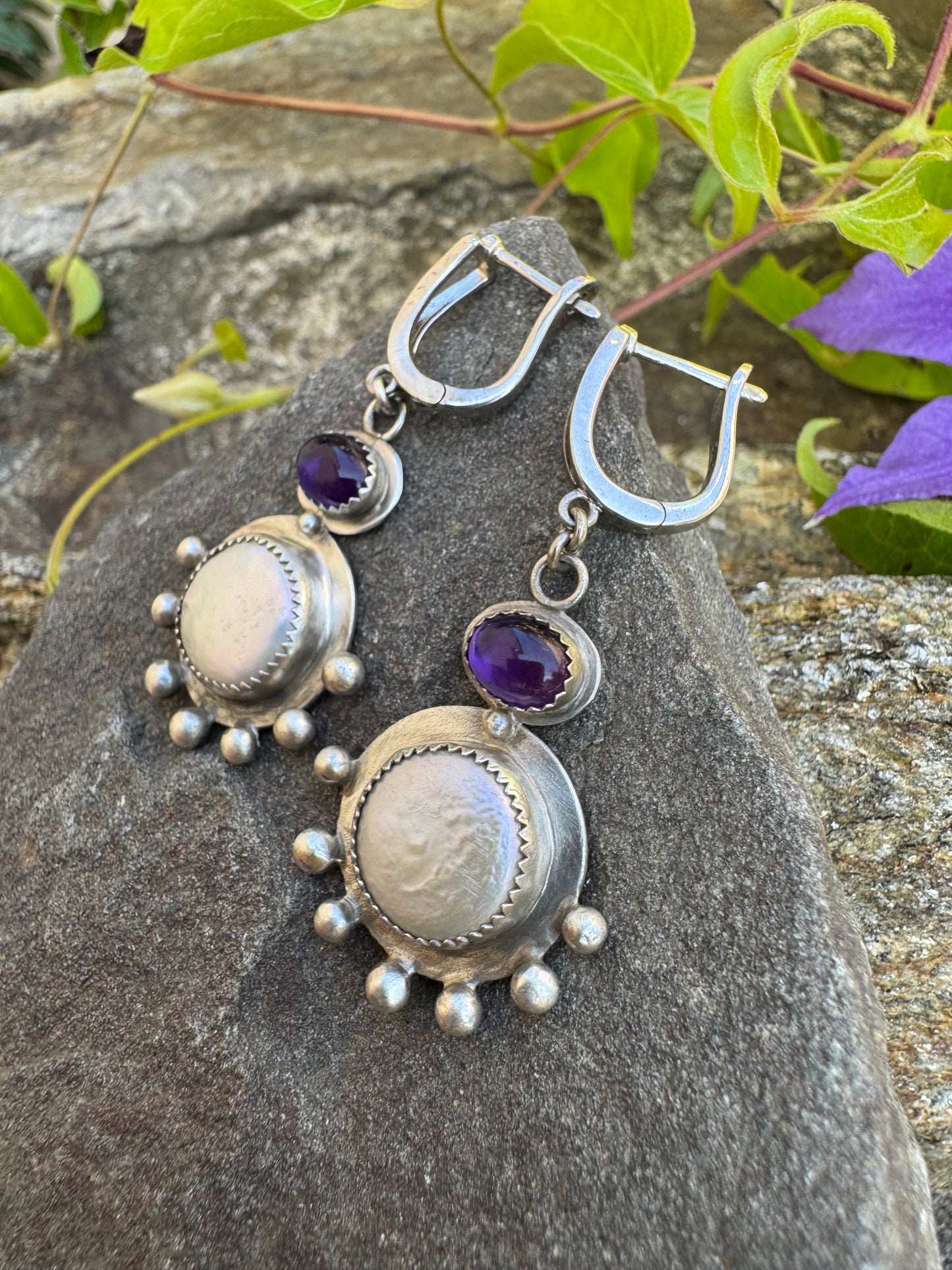 Silver lever-back earrings with deep purple amethyst cabochons and coin pearl accents