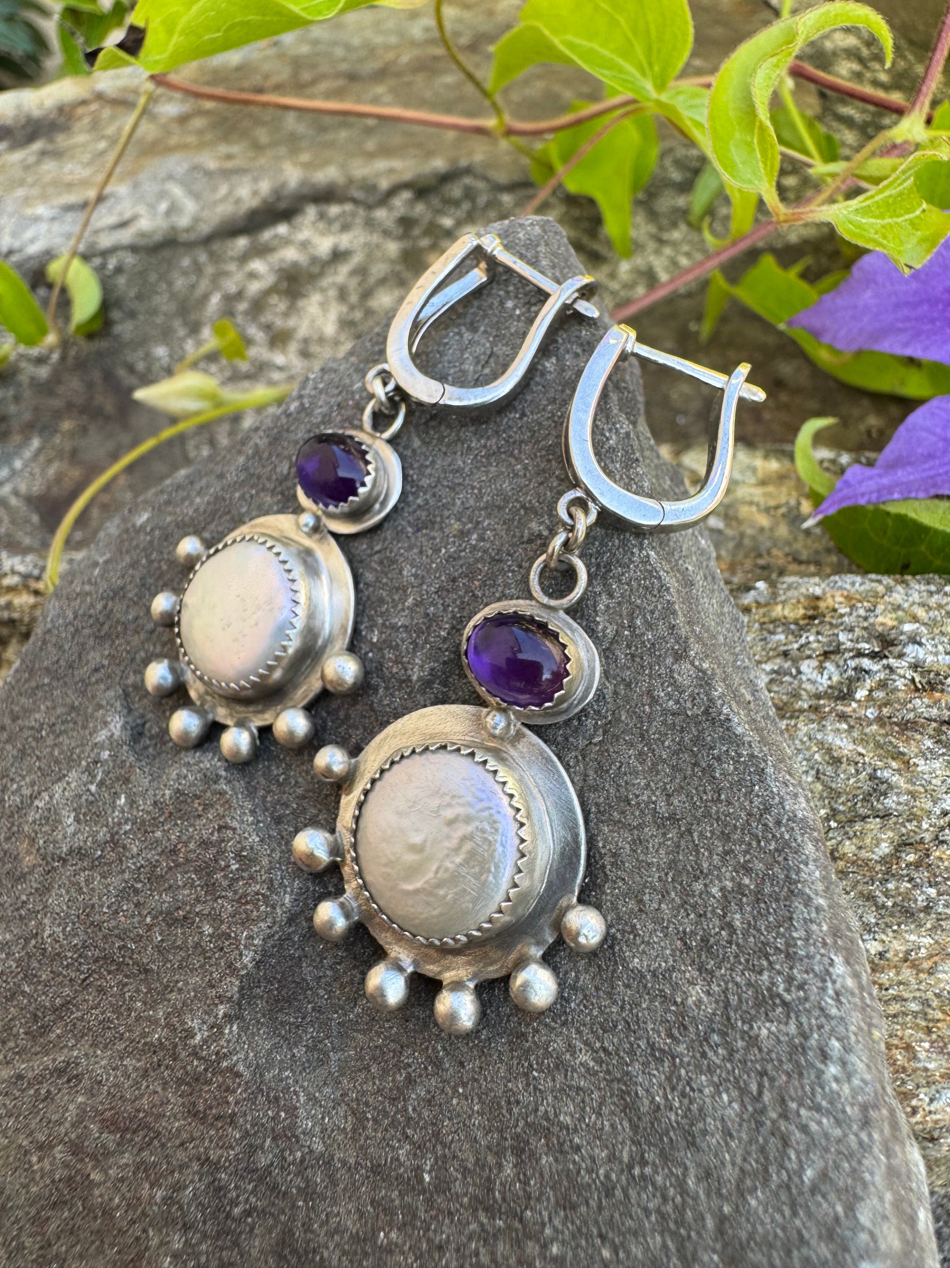 Silver lever-back earrings with deep purple amethyst cabochons and coin pearl accents