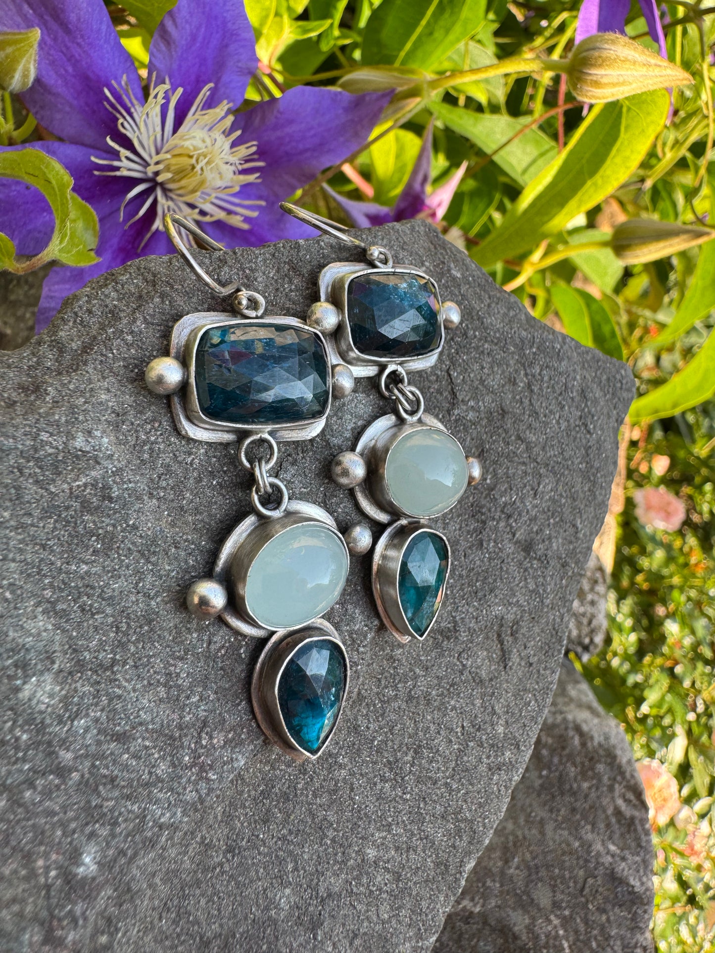 Silver earrings pairing blue kyanite cabochons with soft aquamarine stones
