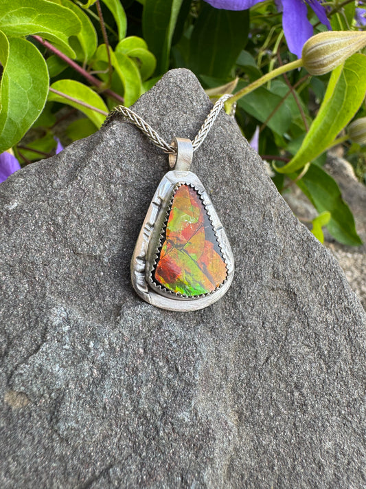 Handmade sterling silver ammolite triangle pendant, front view