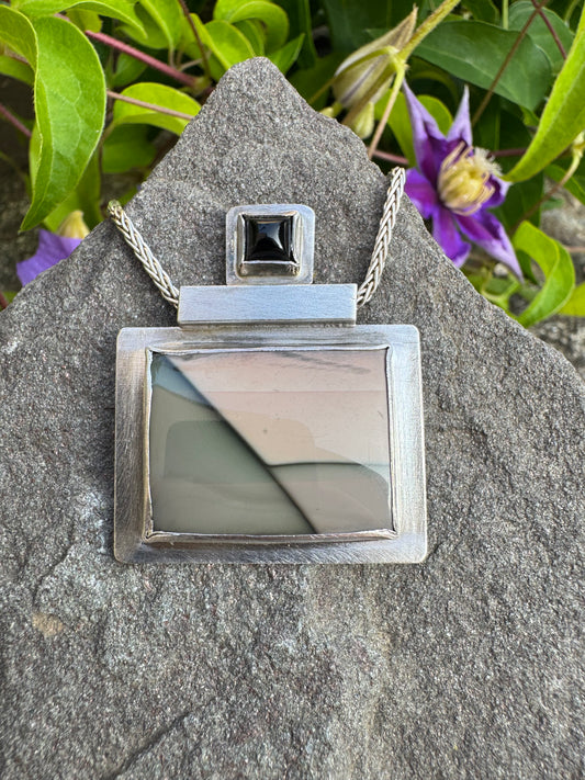 Handmade sterling silver picture jasper rectangle pendant with onyx, front view
