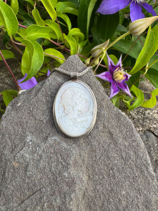 Handmade sterling silver carved mother of pearl cameo pendant, front view