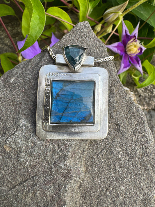 Handmade sterling silver reversible labradorite and kyanite pendant, front view