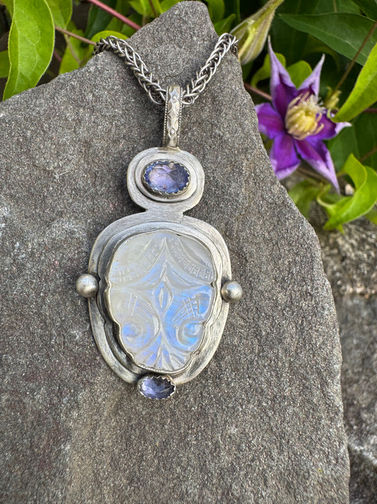 Handmade sterling silver sculpted carved moonstone and amethyst pendant, front view