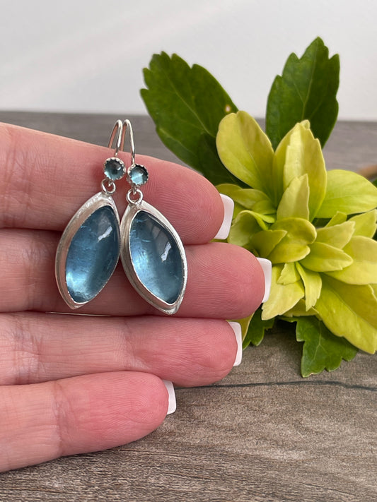 Handmade sterling silver aquamarine teardrop earrings in polished sterling silver, alternate view