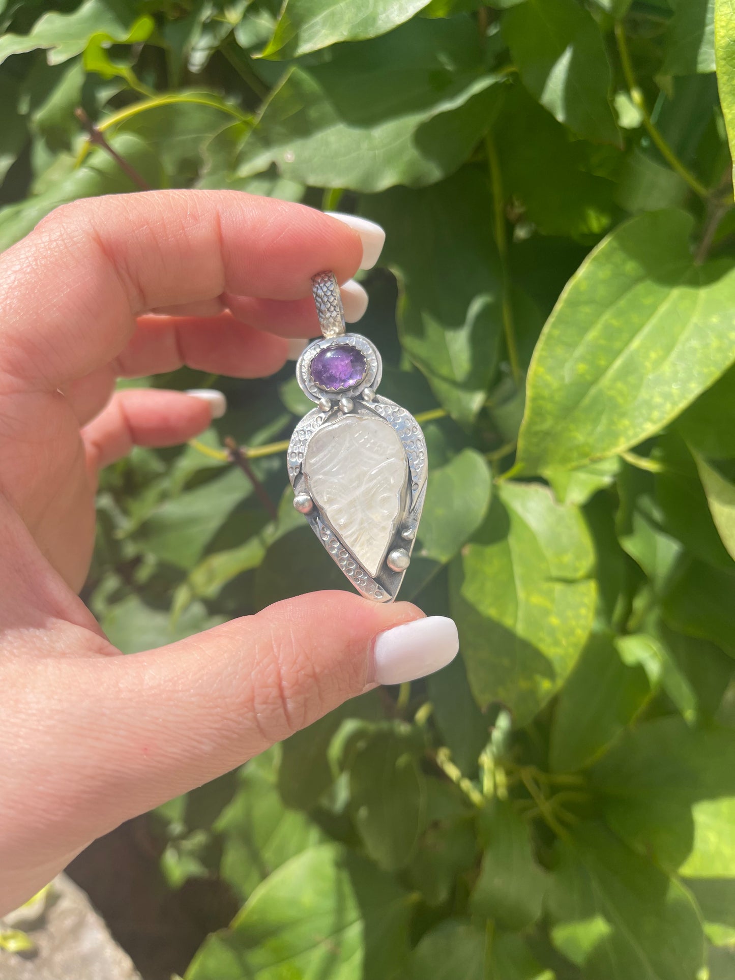 Carved Moonstone and Amethyst Pendant