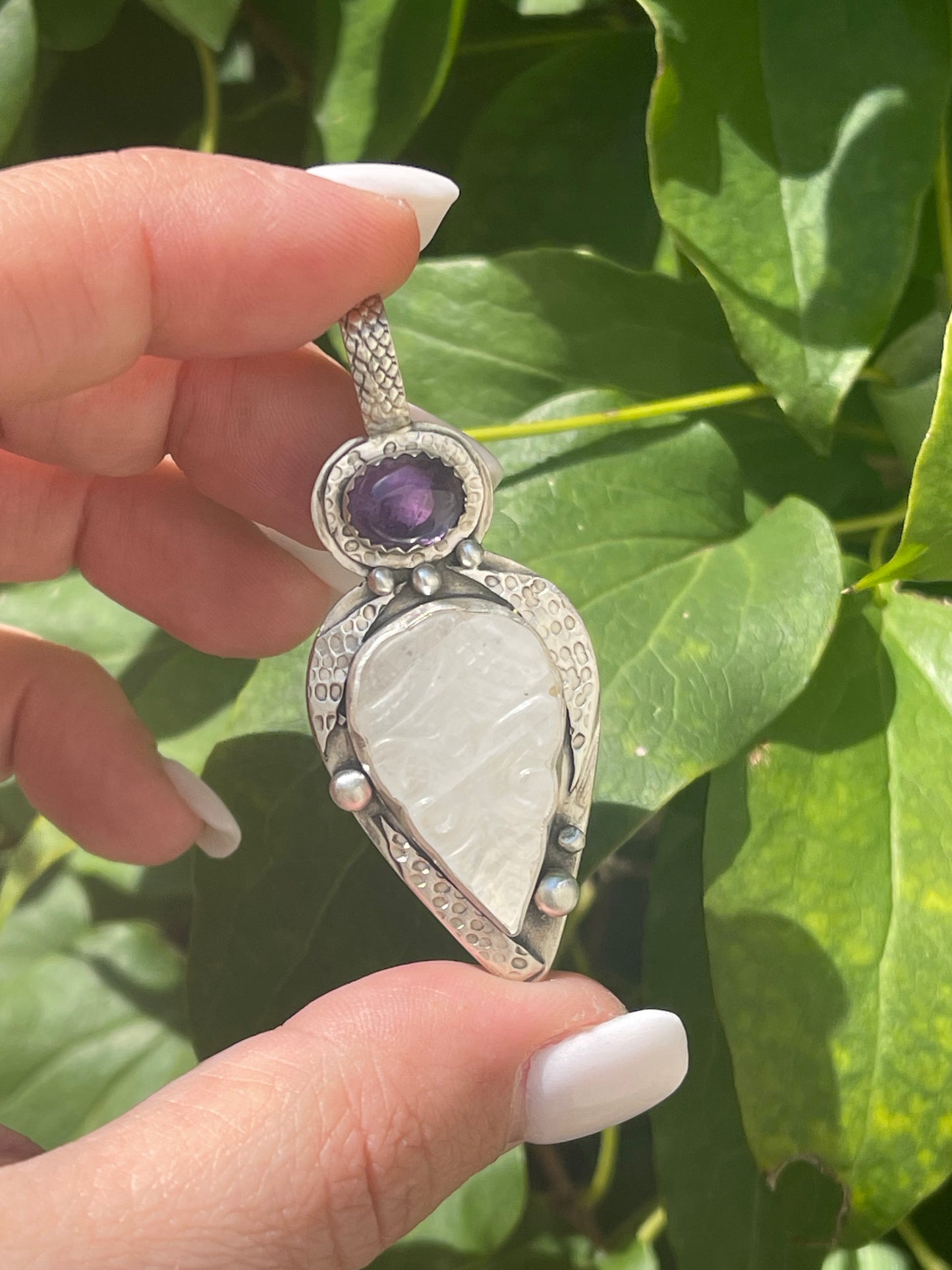 Carved Moonstone and Amethyst Pendant